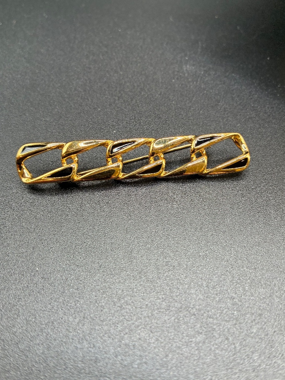 Vintage 80’s Monet pin with black enamel accents